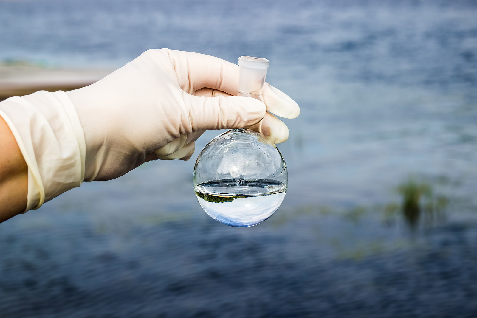 Woman_hodling_water_tube_lab_iStock-866470840.jpg